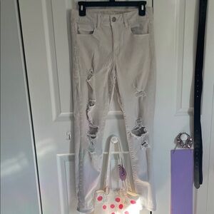 American Eagle Outfitters Cream Distressed Skinny Jeans